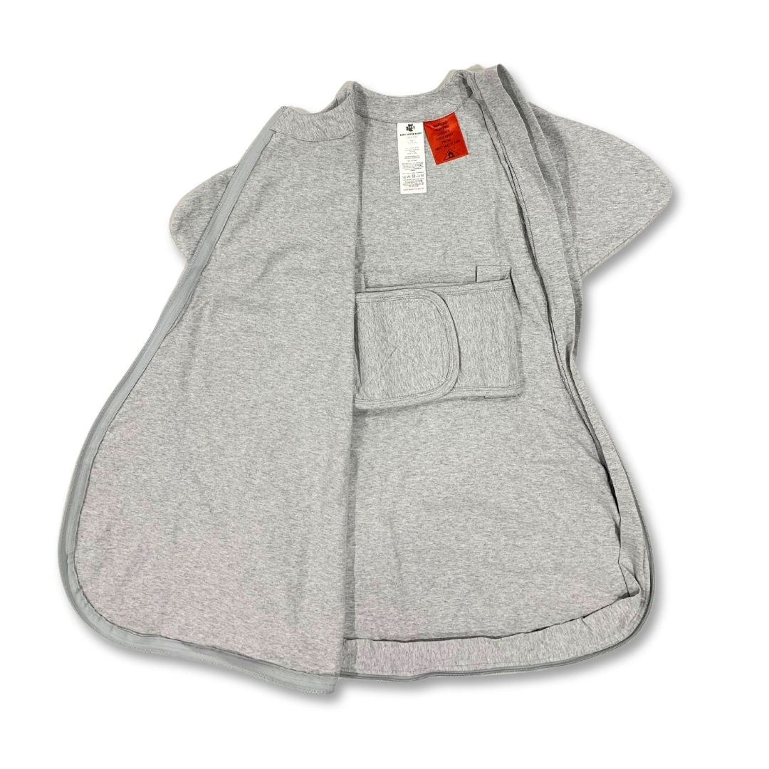 Baby sleeping bag with belly band for transitioning from swaddling to free arms