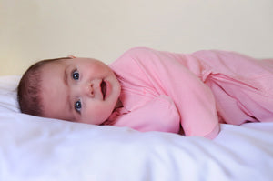 Summer baby sleep sack for a gentle transition from swaddling to free arms