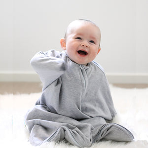 Baby sleeping bag for transitioning from swaddle to free arms