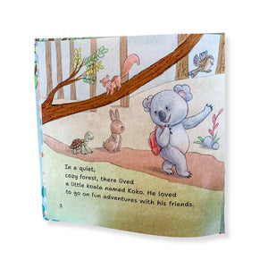 A book page inside an adorable children's bedtime story book 'Koko's Missing Blankie', Koko the koala is with friends in a forest