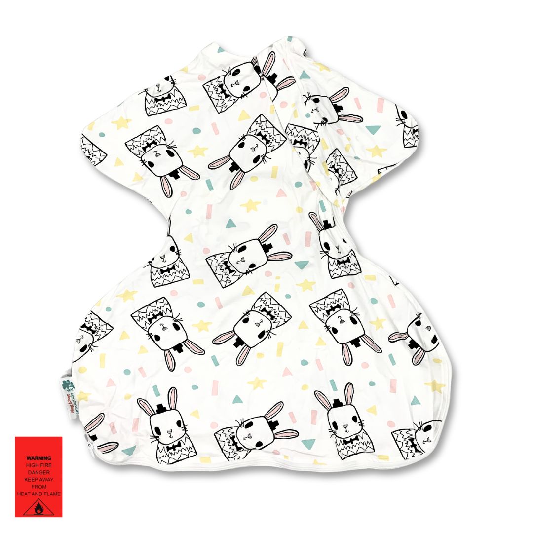 Extra-wide baby sleepsuit for babies wearing a hip harness