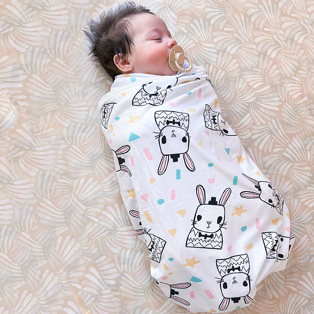 Newborn swaddle wrap to calm the startle reflex.