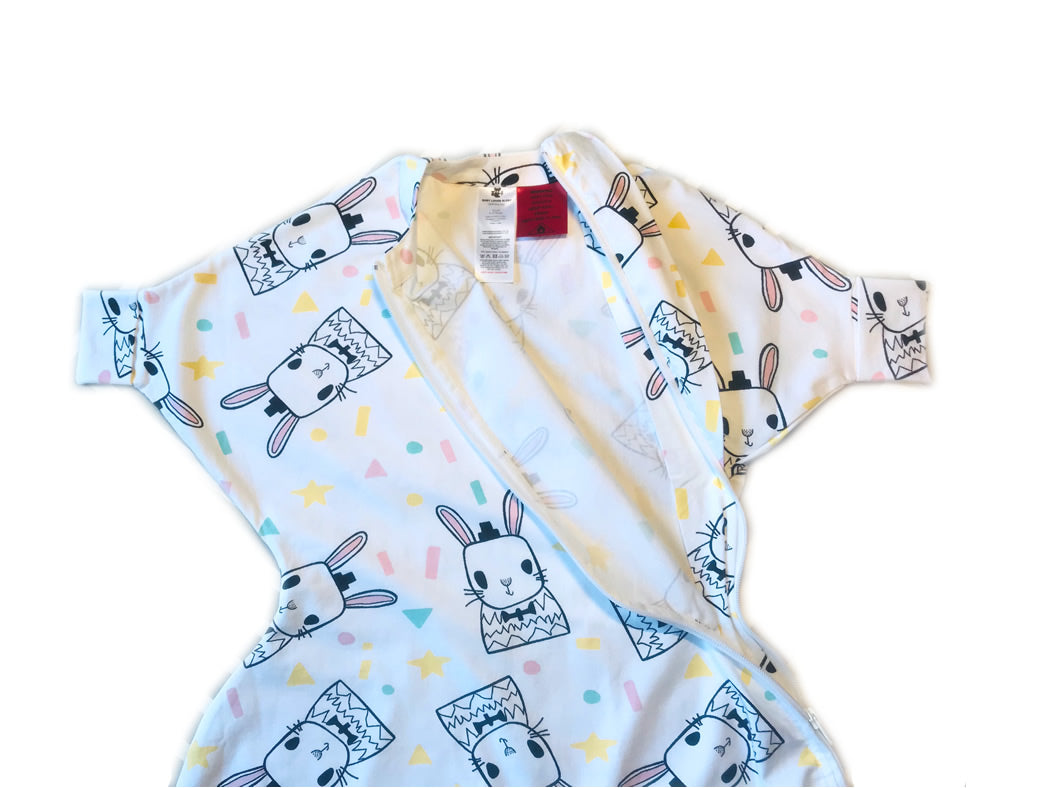 Sleepy Hugs sleep sack for gentle swaddle transitioning from swaddle to free arms, helps startle reflex for babies starting to roll
