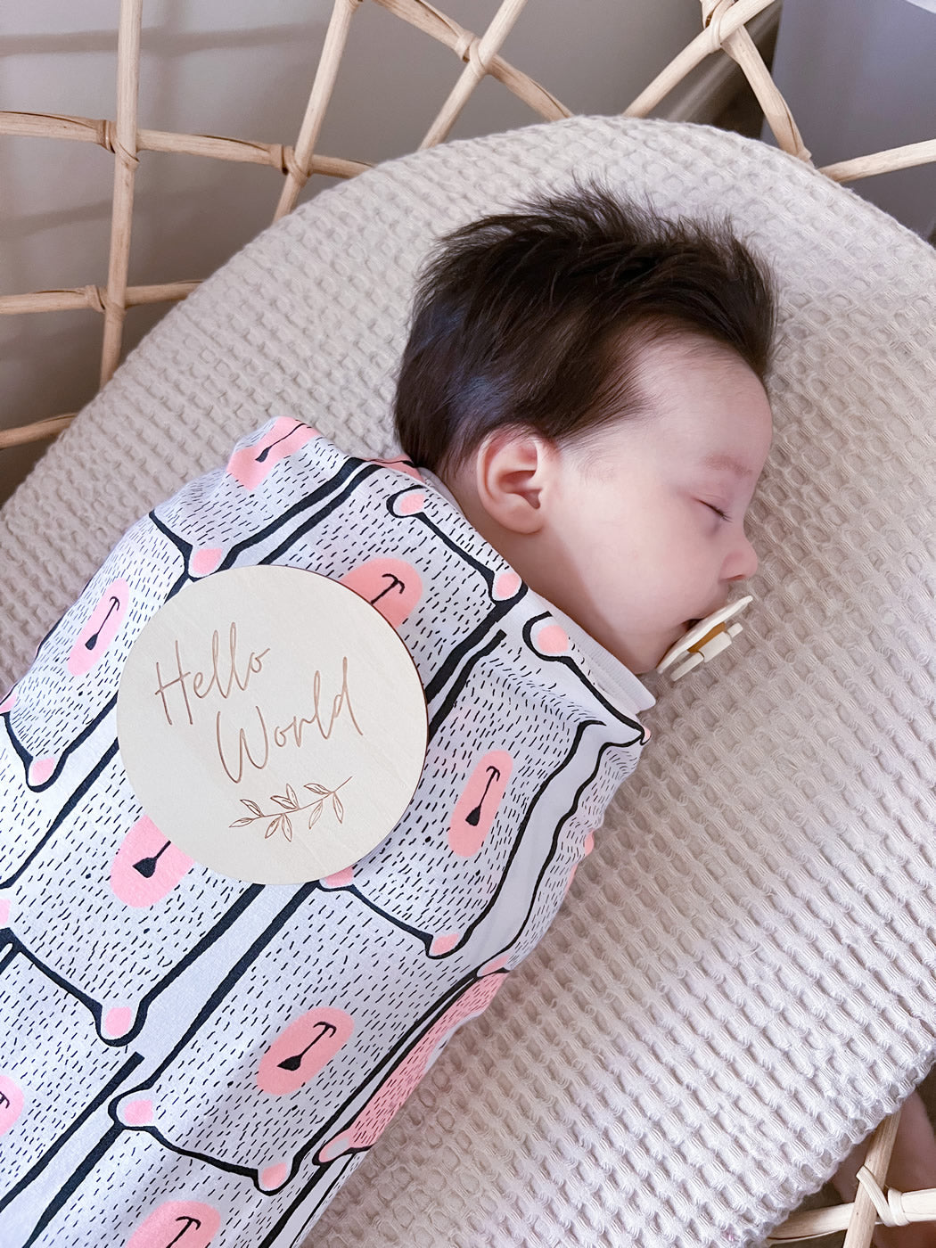 Koala Hugs newborn swaddle wrap helps calm the startle reflex and keeps babies sleeping longer.