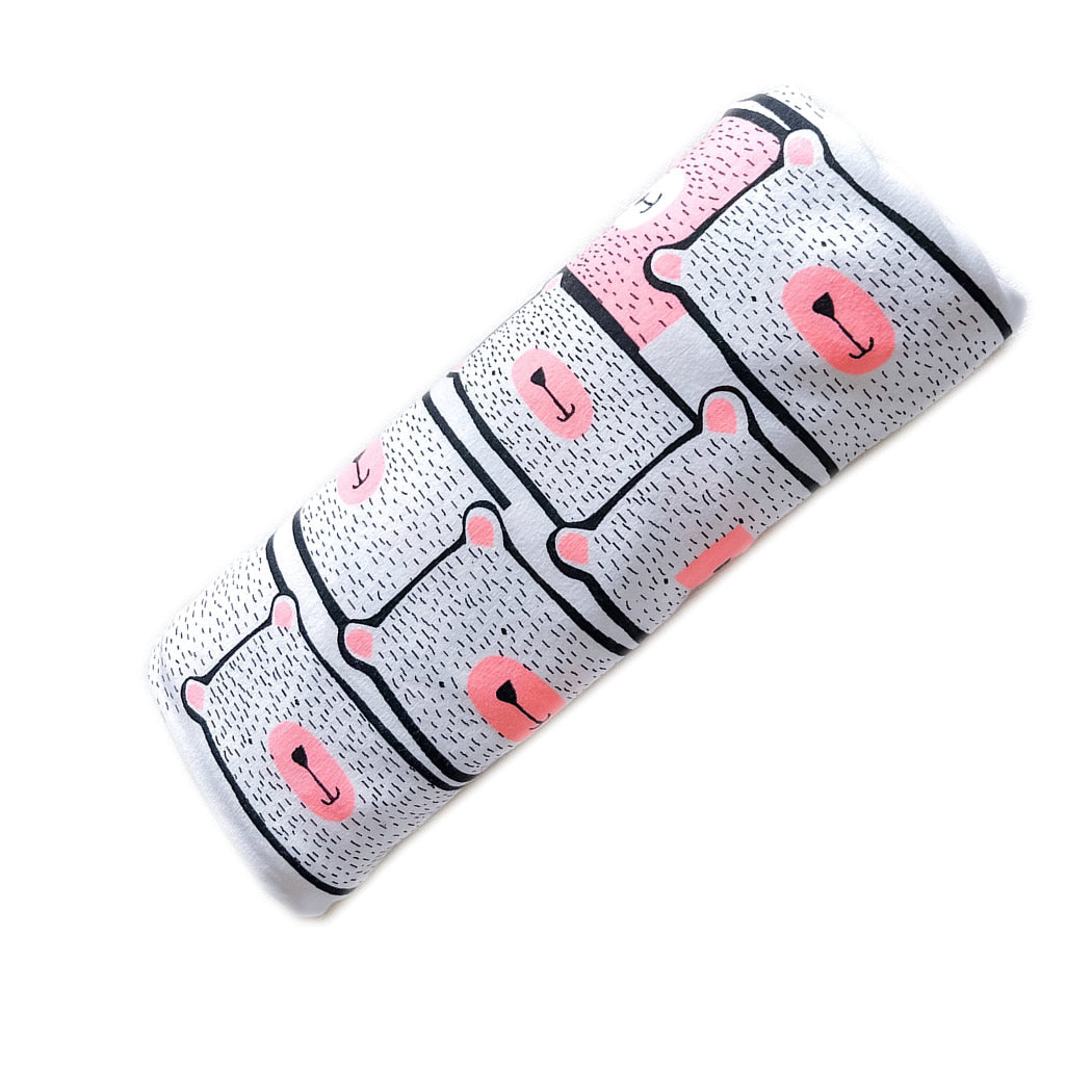 Koala Hugs newborn swaddle wrap helps calm the startle reflex and keeps babies sleeping longer.