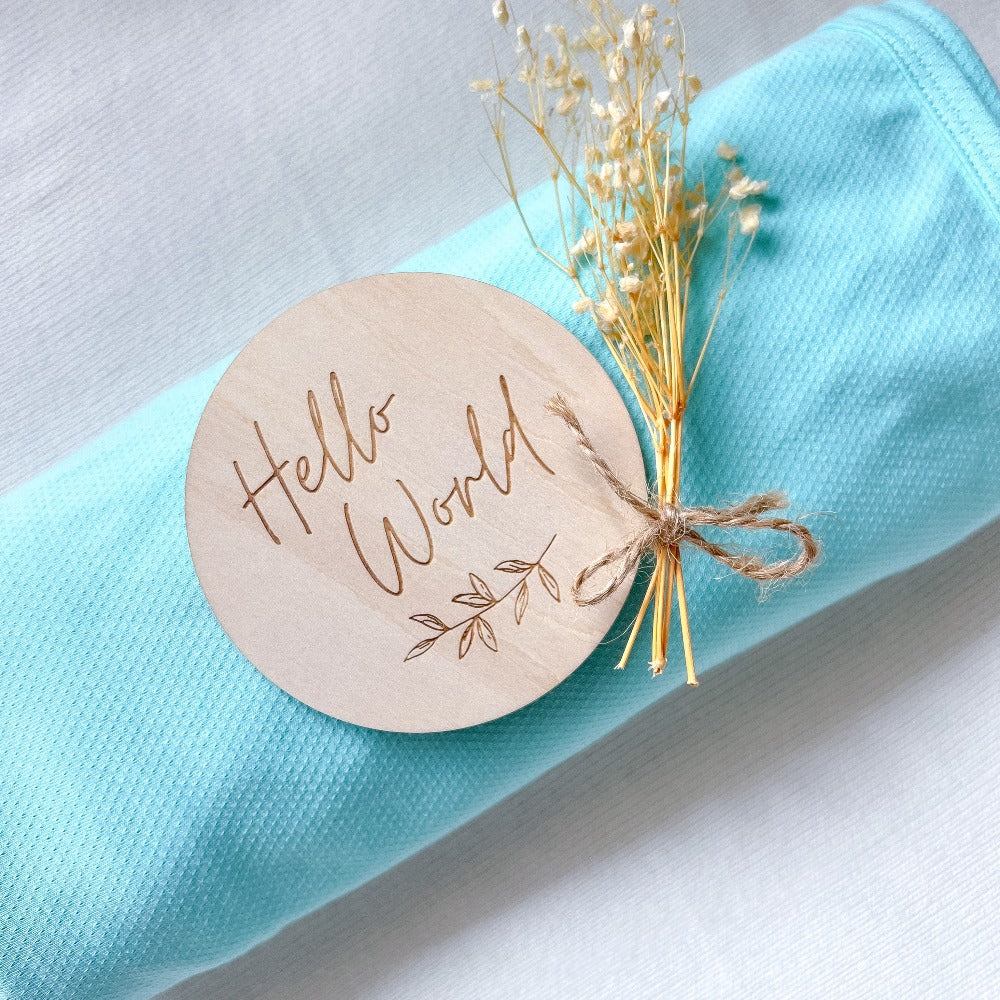 Koala Hugs newborn swaddle wrap gently cocoons baby's arms to help calm the startle reflex.