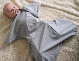 Baby sleeping bag with sleeves for babies with hip dysplasia