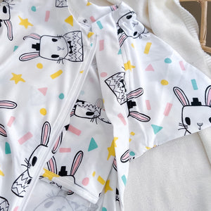 Sleepy Hugs sleep sack for gentle swaddle transitioning to free arms, calms the startle reflex, perfect for tummy rollers